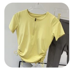 Tee with zip and ties in sides